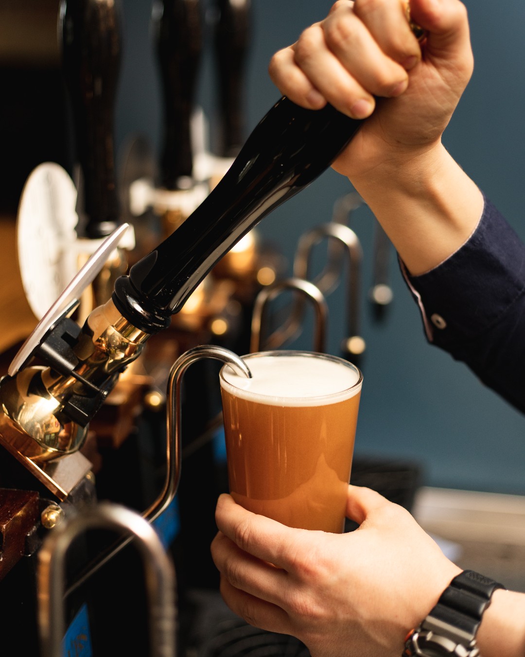 Pouring a pint of cask ale